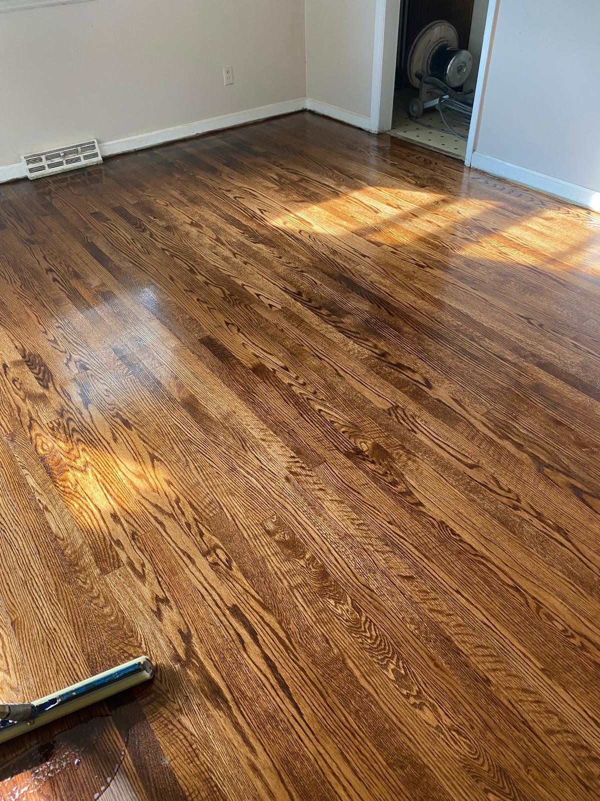 Refinished dark hardwood floor